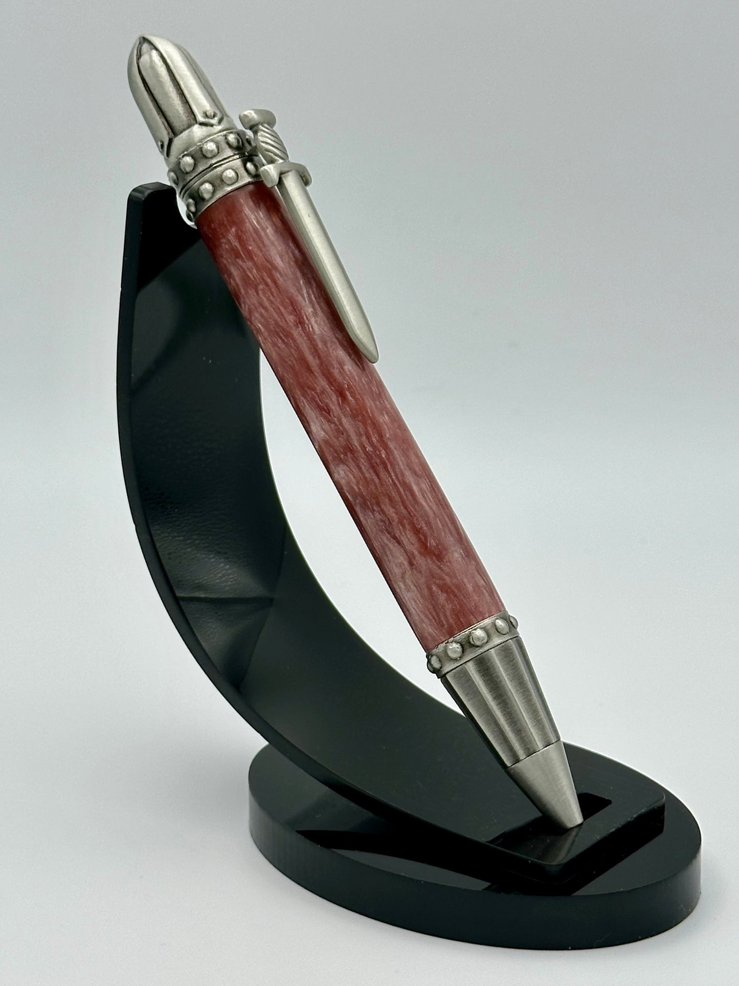 Battleworn Ruby — Weathered Red Medieval Sword Pen
